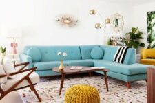 a welcoming mid-century modern living room with a turquoise sofa, elegant mid-century modern furniture and touches of gold for chic