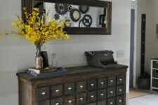 12 a vintage apothecary cabinet on casters as a stunning antique entryway console is a beautiful idea