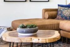 14 a lovely tree slice hairpin leg coffee table with a laminated surface is a stylish addition to a mid-century modern living room