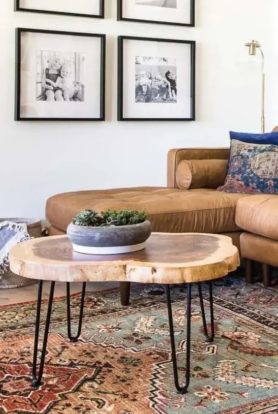 a lovely tree slice hairpin leg coffee table with a laminated surface is a stylish addition to a mid-century modern living room