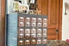 31 a renovated card cabinet on tall legs with various decor is a lovely soluton for a vintage or rustic entryway