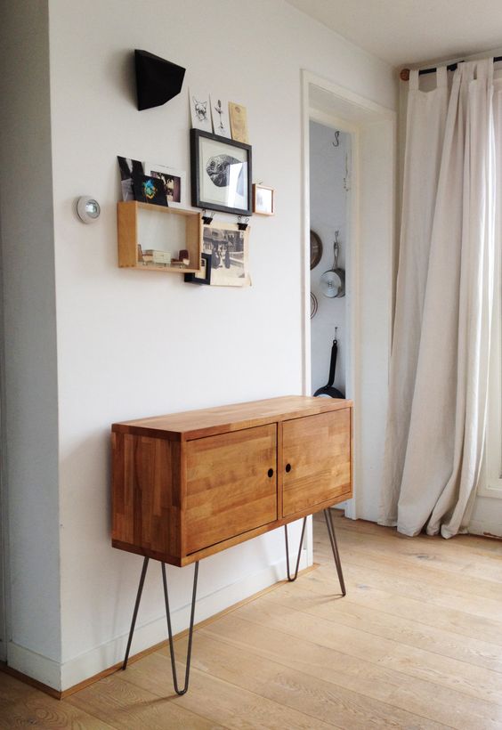 a stained cabinet with hairpin legs will be a nice solution for a mid-century modern or boho space, you can even DIY one