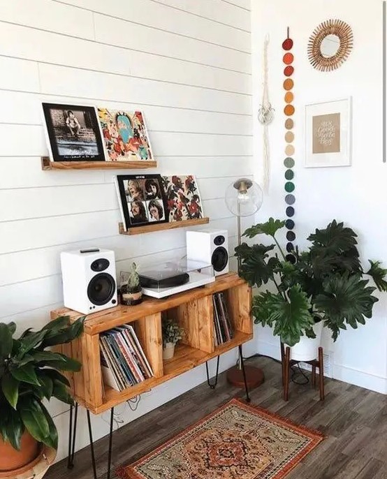 a beautiful and stylish music console of a crate box with hairpin legs will perfectly match a boho or mid-century modern space