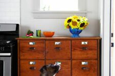 49 a vintage stained card cabinet turned into a kitchen storage unit is a cool and creative way to upcycle an old unit