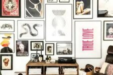a bold and eye-catchy gallery wall with various types of art in mismatching black frames will make a statement anywhere
