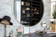 a cool makeup nook with a round mirror
