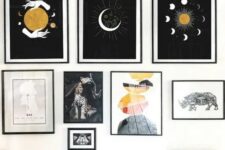 a witchy gallery wall with thin black frames, bold prints, vintage artworks and photos is a catchy idea