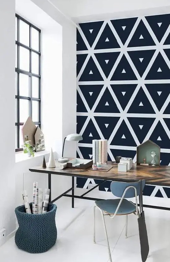 monochromatic geometric self-adhesive wallpaper is a great idea for a modern workspace, to make it bolder and statement-like