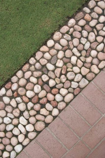 a concrete and pebble garden edge is a cool way to add a natural feel to the space and make it cooler, brighter and fresher