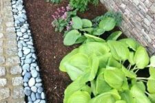11 catchy garden bed edging with pebbles is a stylish idea for many spaces, make a gutter with pebbles for a more modern and neater look