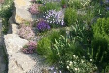 14 large rock garden bed edging is a stylish idea that looks all-natural and relaxed, this is a very durable idea