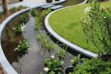 15 an ultra-modern curved water garden of greenery and white blooms is an amazing idea for a modern garden