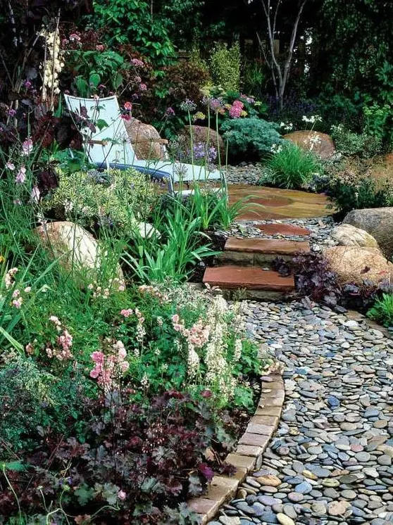 brick edging and a pebble path is a stylish idea   you'll get a natural feel and a touch of well grooming at the same time