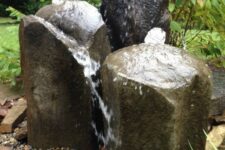 21 a basalt fountain is a cool idea for a desert garden, it looks very natural and refreshing