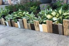 23 simple and catchy garden bed edging done with mismatching woodne planks in various colors