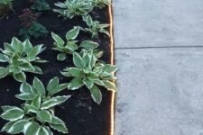 26 LED lights as garden edging is a very neat and chic idea to bring an ultimate modern look to the space