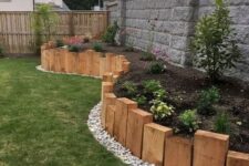 26 timber pieces as garden bed edging are a cool idea for a rustic garden, you may use reclaimed wood