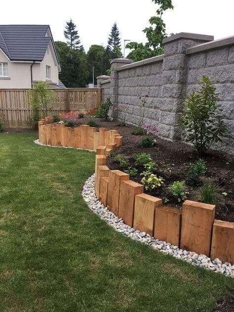 timber pieces as garden bed edging are a cool idea for a rustic garden, you may use reclaimed wood
