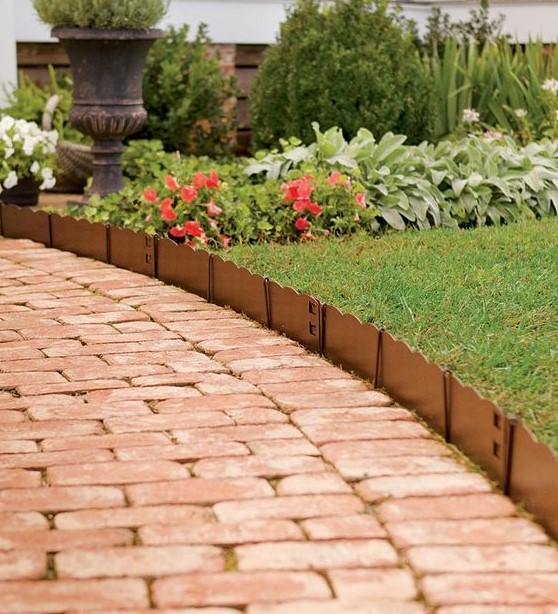 scallop garden bed edging and red bricks are a cool and very bright combo with high durability