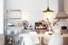 a cozy Scandi kitchen design with Eames chairs