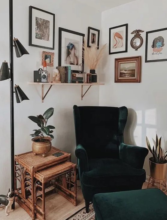a chic boho nook with a green Strandmon chair and a matching ottoman, a shelf, a gallery wall and a couple of rattan side tables