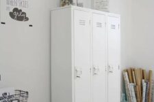 a craft room completed with white lockers that are used for storing all the stuff you want and need
