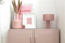 a dusty pink locker unit with various decor can easily match many spaces, and its delicate will makes it look softer