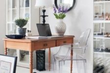 a lovely home office with a vintage desk