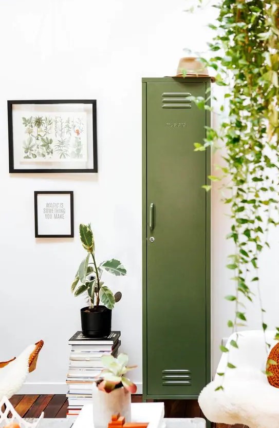 a single green locker placed in a living room doesn't look too bold, bulky or rough, thanks to its soft color