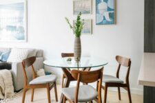 a small dining space with cute table and chairs