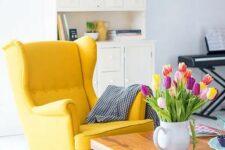 a lovely space with an yellow chair
