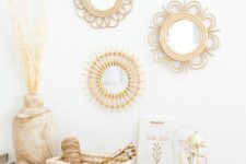 an arrangement of small round mirrors in woven frames is a cool idea for a boho or rustic interior and you can DIY them