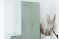 beautiful sage green lockers look very delicate and subtle and add a delicate touch of color to the space