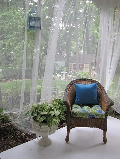 cover the porch or terrace with mosquito net curtains for privacy, to separate spaces and of course get saved from bugs