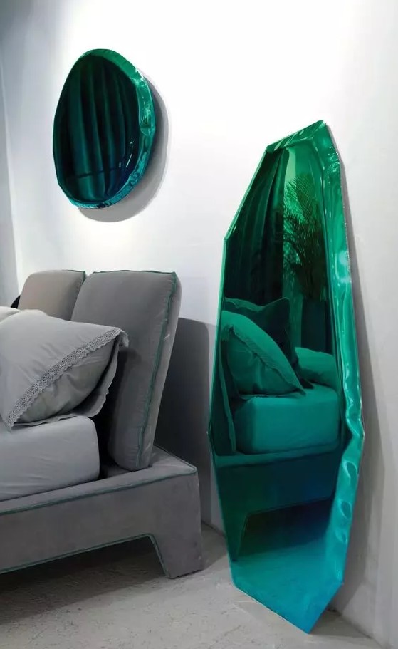 fabulous green mirrors of irregular shapes look like liquid metal placed on the floor or wall is a gorgeous idea