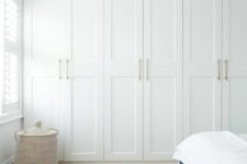 a lovely neutral bedroom with built-in ikea pax wardrobes