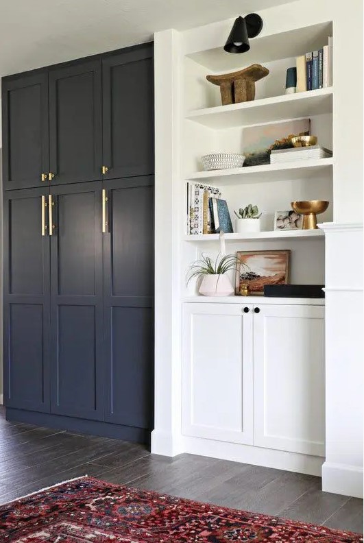 navy paneled front doors plus brass handles give a Pax item a chic look and amke it perfect for a modern farmhouse space