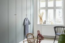 43 sleek built-in grey IKEA Pax wardrobes with gold knobs are an elegant and chic idea for a Scandinavian or modern space