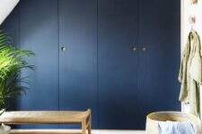 47 very chic Pax hack for an attic space, with a smokey blue shade and natural oak handles