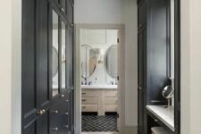 55 a stylish walk-in closet with built-in IKEA PAx wardrobes with elegant brass knobs and mirrors and a vanity with a stool