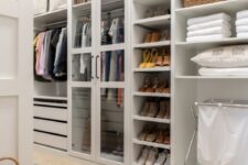 56 a whole walk-in closet created of IKEA PAx wardrobes, with open shelves, drawers and glass doors is a cool and smart solution