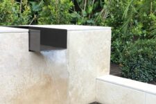 16 a modern waterfall with a large water feature is a cool idea for a modern garden, it looks laconic and stylish
