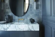 16 a refined moody bathroom with graphite grey walls and a vanity, a grey zellige tile backsplash and a marble countertop is wow