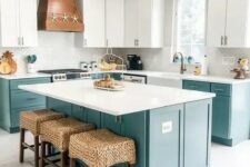 a bright kitchen with white and turquoise cabinets, a white tile backsplash and white countertops, a wooden hood with starfish and beautiful woven stools