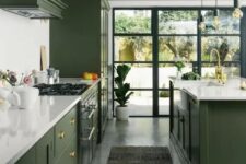 a modern flat panel green kitchen design