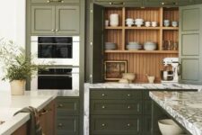 a vintage olive green kitchen with shaker cabinets, a stained kitchen island, white stone countertops and open shelves