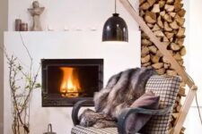02 stack your firewood right next to the fireplace making the room cozy, welcoming and warm