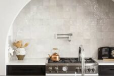 a stylish arched niche around a cooker