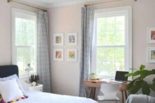 25 a cozy and wlecoming guest bedroom features a small desk by the window and a modern chair