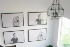 a cool black and white grid gallery wall with black frames shows off kids’ pics and adds fun and coziness to the space